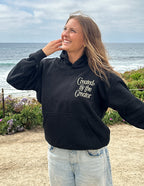 Elevated Faith Christian Hoodie in black with 'Created by the Creator' text for stylish comfort