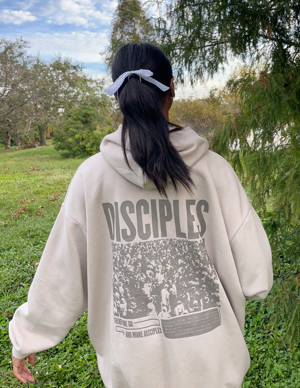 Elevated Faith Christian Hoodie in beige with large 'DISCPLES' graphic on the back
