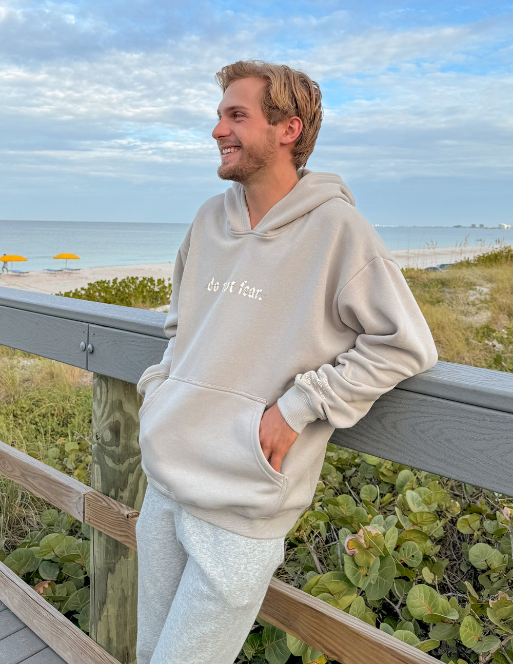 Elevated Faith Christian Hoodie in light beige with 'Do Not Fear' text on the front, perfect for casual wear
