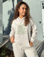Elevated Faith Christian Hoodie in light beige with 'Don't Keep Jesus to Yourself' text design