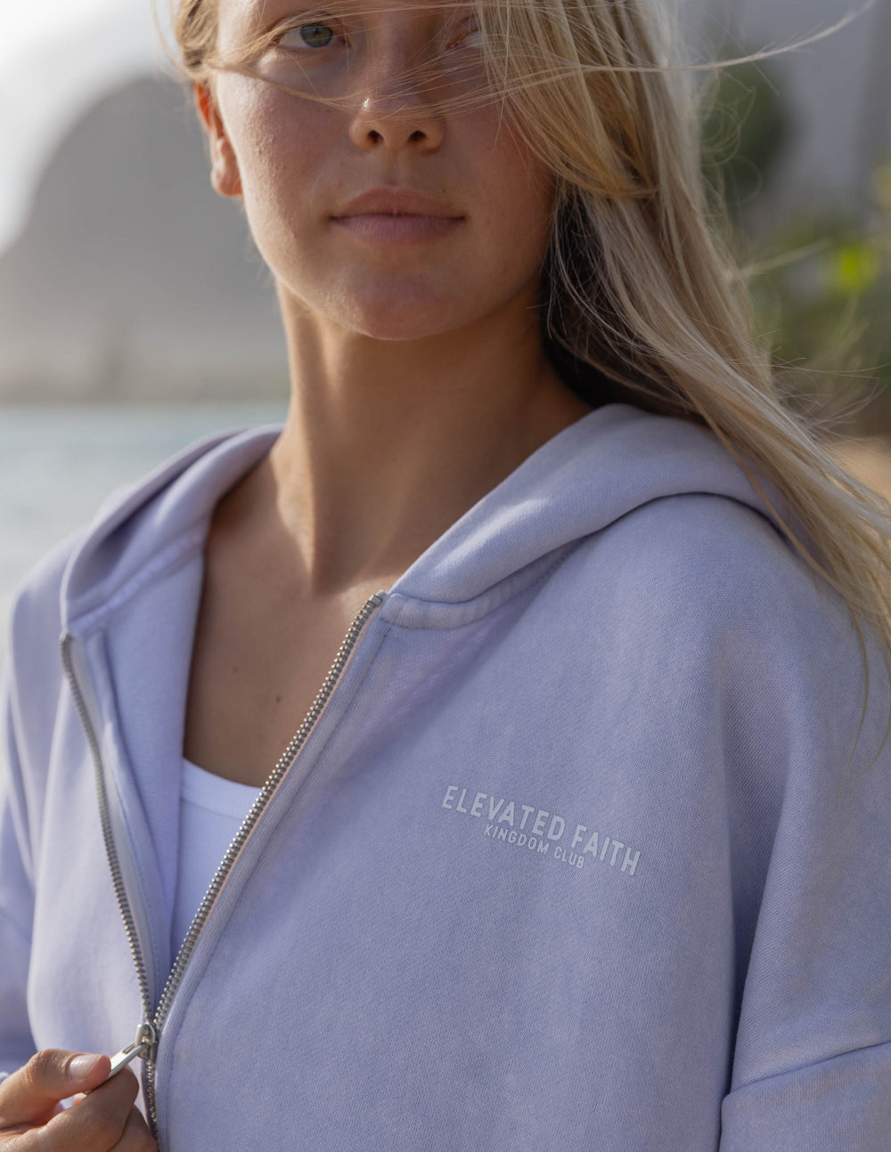 Light purple Elevated Faith Christian Hoodie featuring a zip-up design and soft fabric for comfort