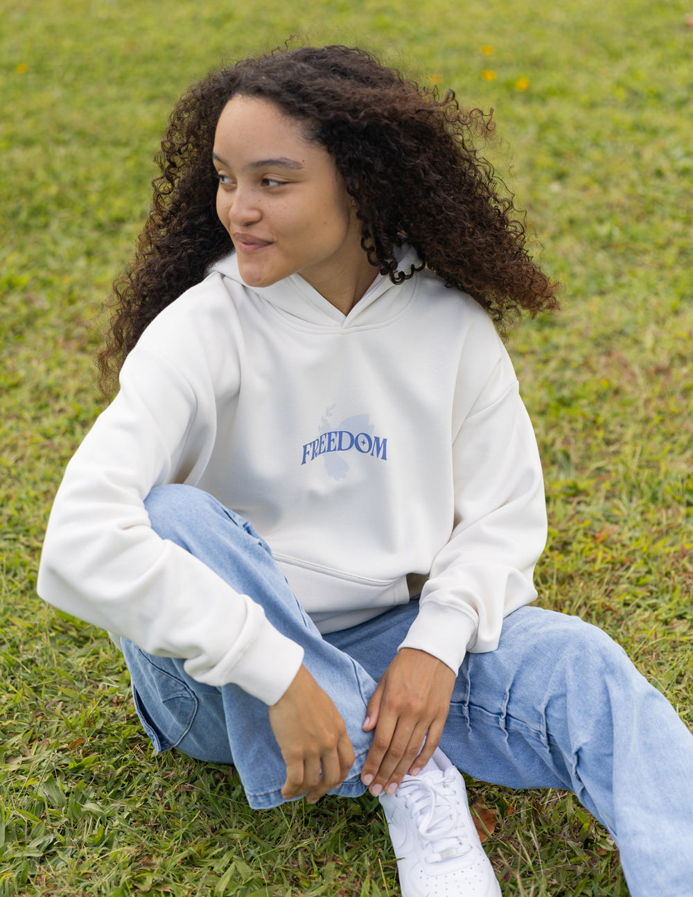 Elevated Faith Christian Hoodie in white featuring the word FREEDOM for a stylish casual look