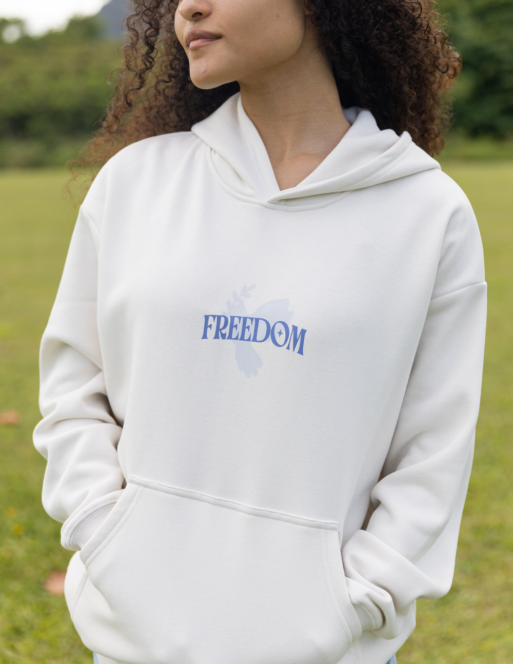 Elevated Faith Christian Hoodie in White with 'FREEDOM' Graphic Print for Casual Wear