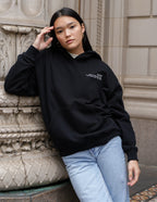 Elevated Faith Christian Hoodie in Black, featuring a relaxed fit and front pocket for comfort
