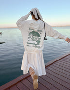 Elevated Faith Christian Hoodie in cream with a healing message graphic on the back