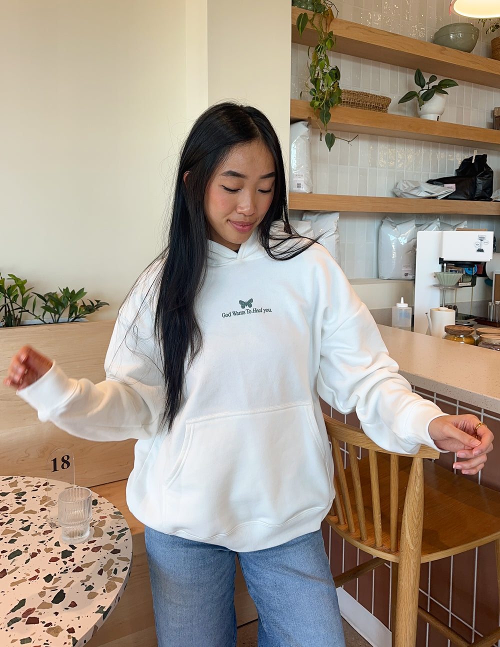 Elevated Faith Christian Hoodie in white featuring a message design and cozy fit for everyday wear