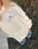 Elevated Faith Christian Hoodie in cream with butterfly design and healing message