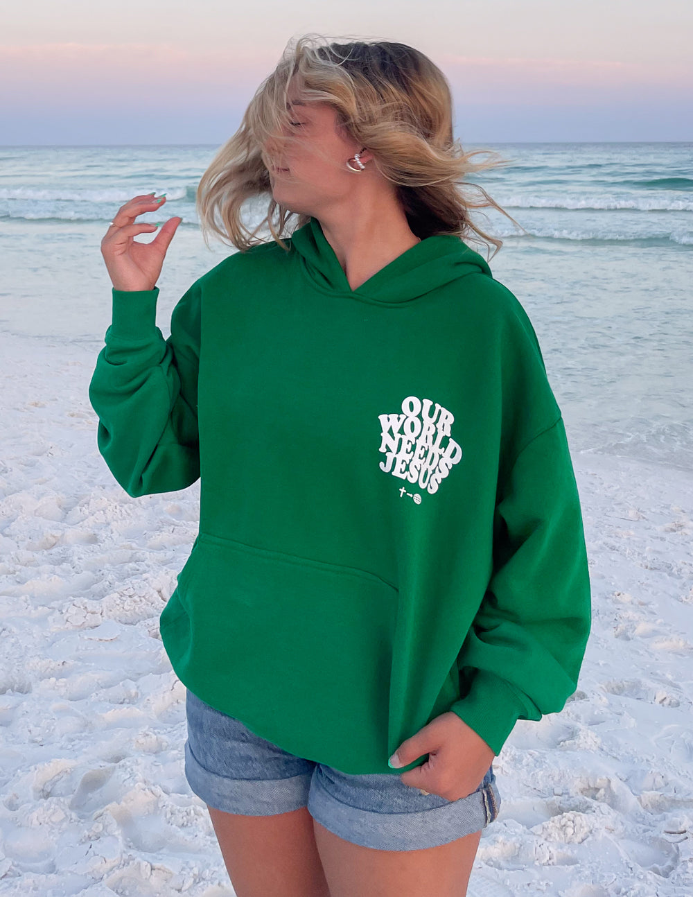 Green Christian Hoodie from Elevated Faith with the message Our Need for Jesus on the front
