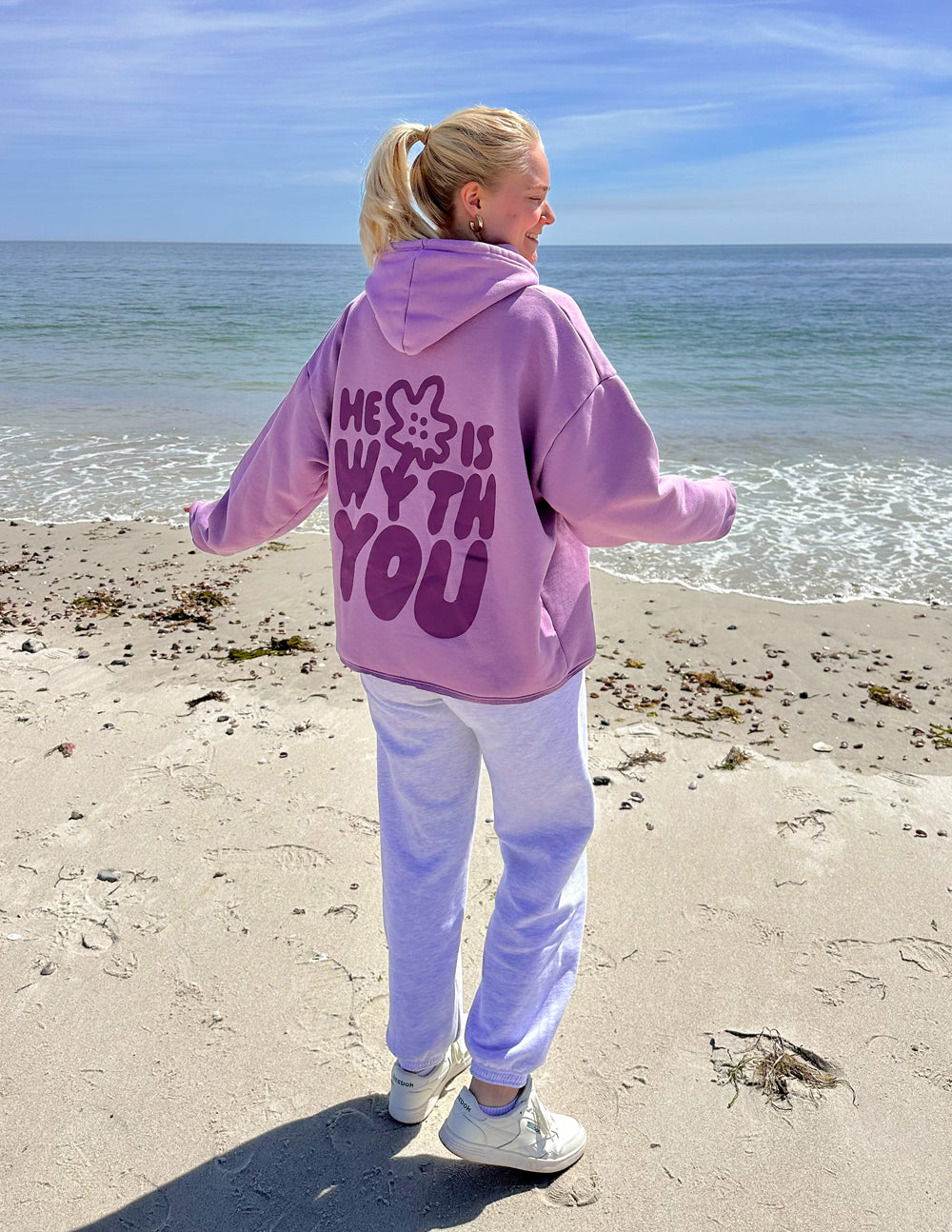 Elevated Faith Christian Hoodie in Lavender with 'He is with you' graphic on the back