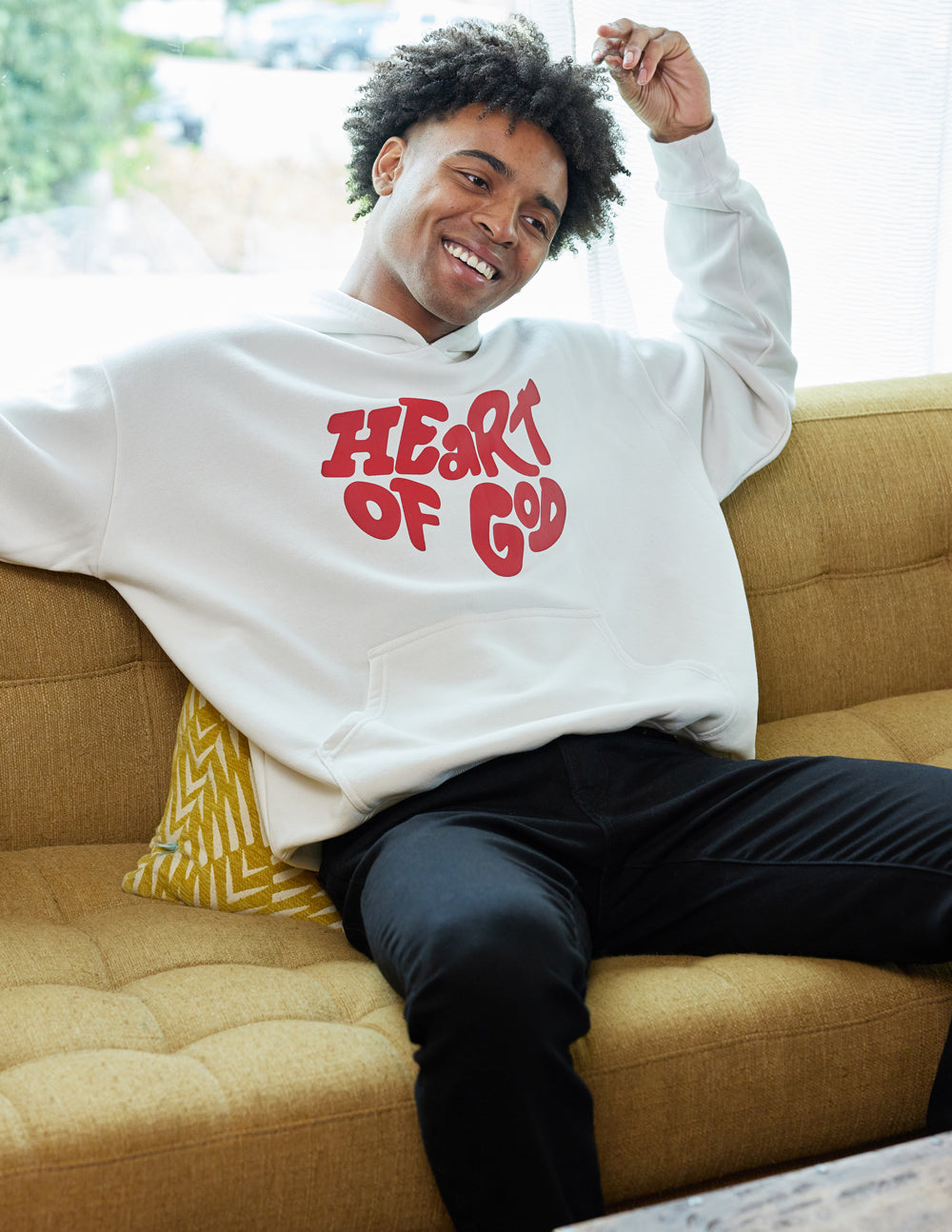 Elevated Faith Christian Hoodie featuring a bold 'Heart of God' graphic on a cozy white design