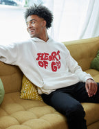 Elevated Faith Christian Hoodie in white featuring bold red text 'HEART OF GOD' for a stylish look