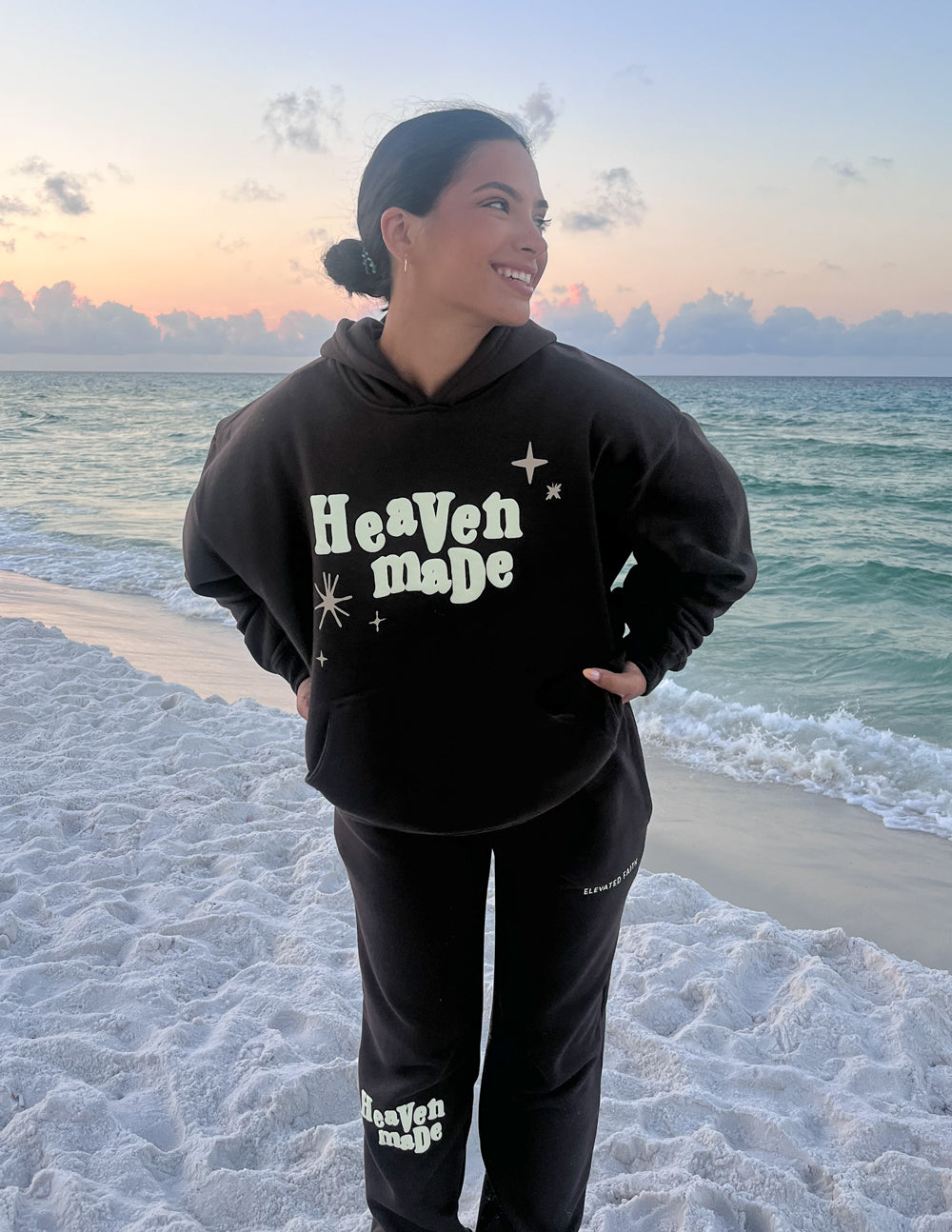 Elevated Faith Christian Hoodie in black with 'Heaven made' design, perfect for casual beach wear