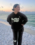 Elevated Faith Christian Hoodie in black with 'Heaven made' design, perfect for casual beach wear
