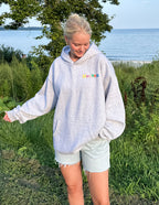 Light gray Christian Hoodie from Elevated Faith with colorful 'Heaven' embroidery on the front