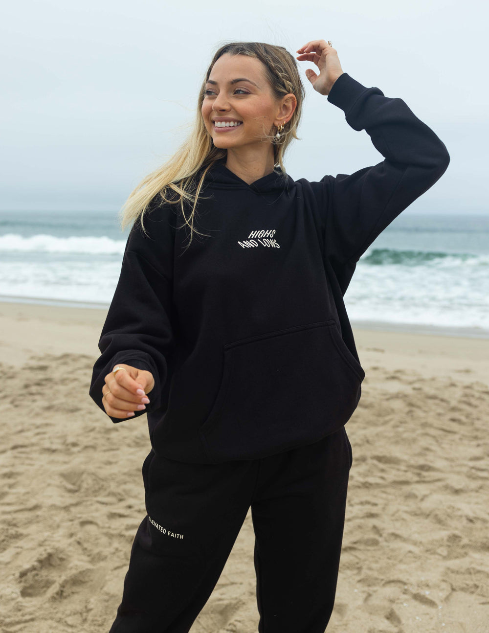 Elevated Faith Christian Hoodie in black for stylish comfort at the beach