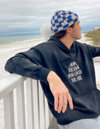Elevated Faith Christian Hoodie in black with inspirational text on the front, perfect for beach outings