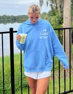 Light blue Christian Hoodie with 'I Am a Child of God' text, ideal for casual outings