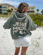 Elevated Faith Christian Hoodie in Olive Green with 'Jesus Holds It All' Graphic for Comfort and Style
