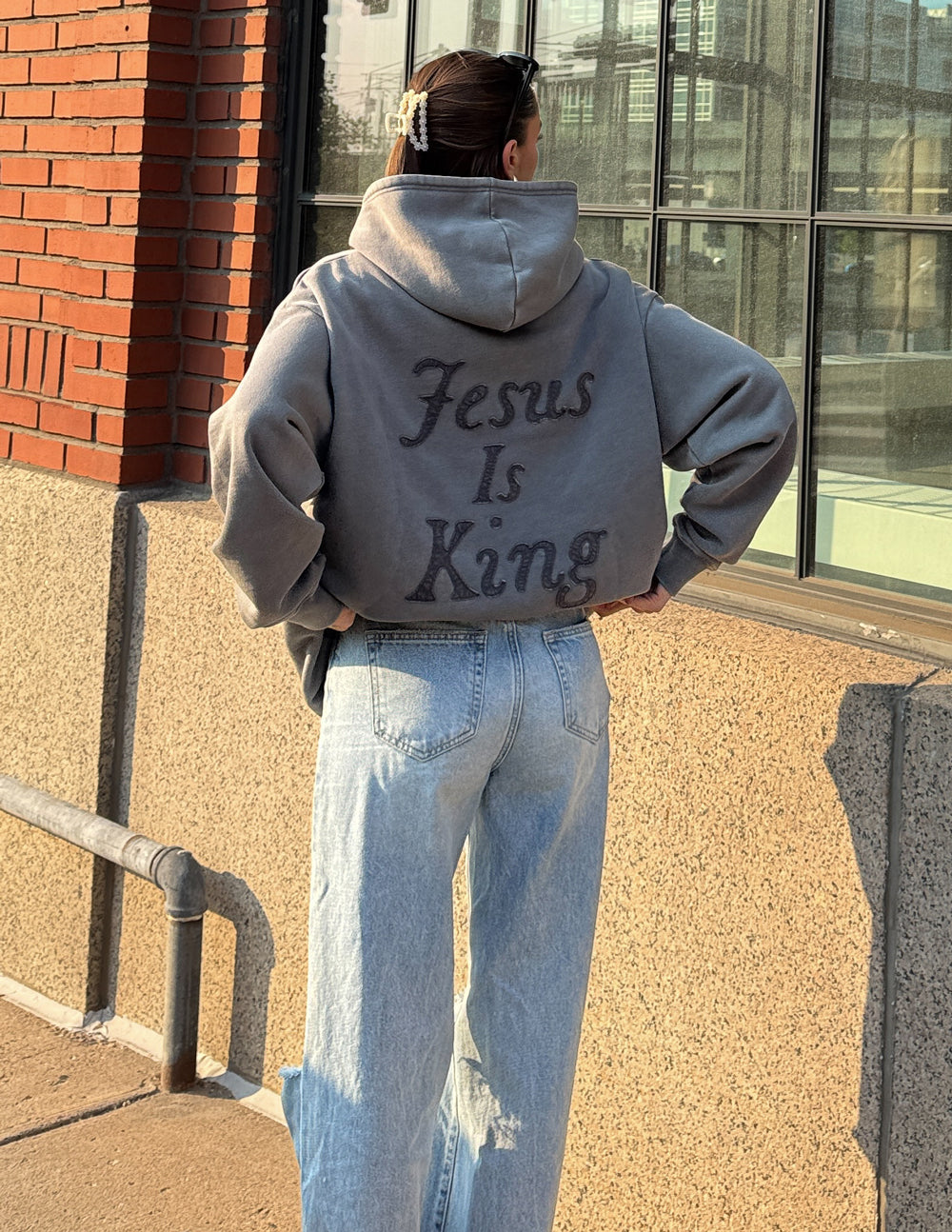 Elevated Faith Christian Hoodie with 'Jesus Is King' text in stylish gray design