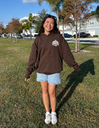 Brown Elevated Faith Christian Hoodie with Kingdom design worn casually for a stylish look