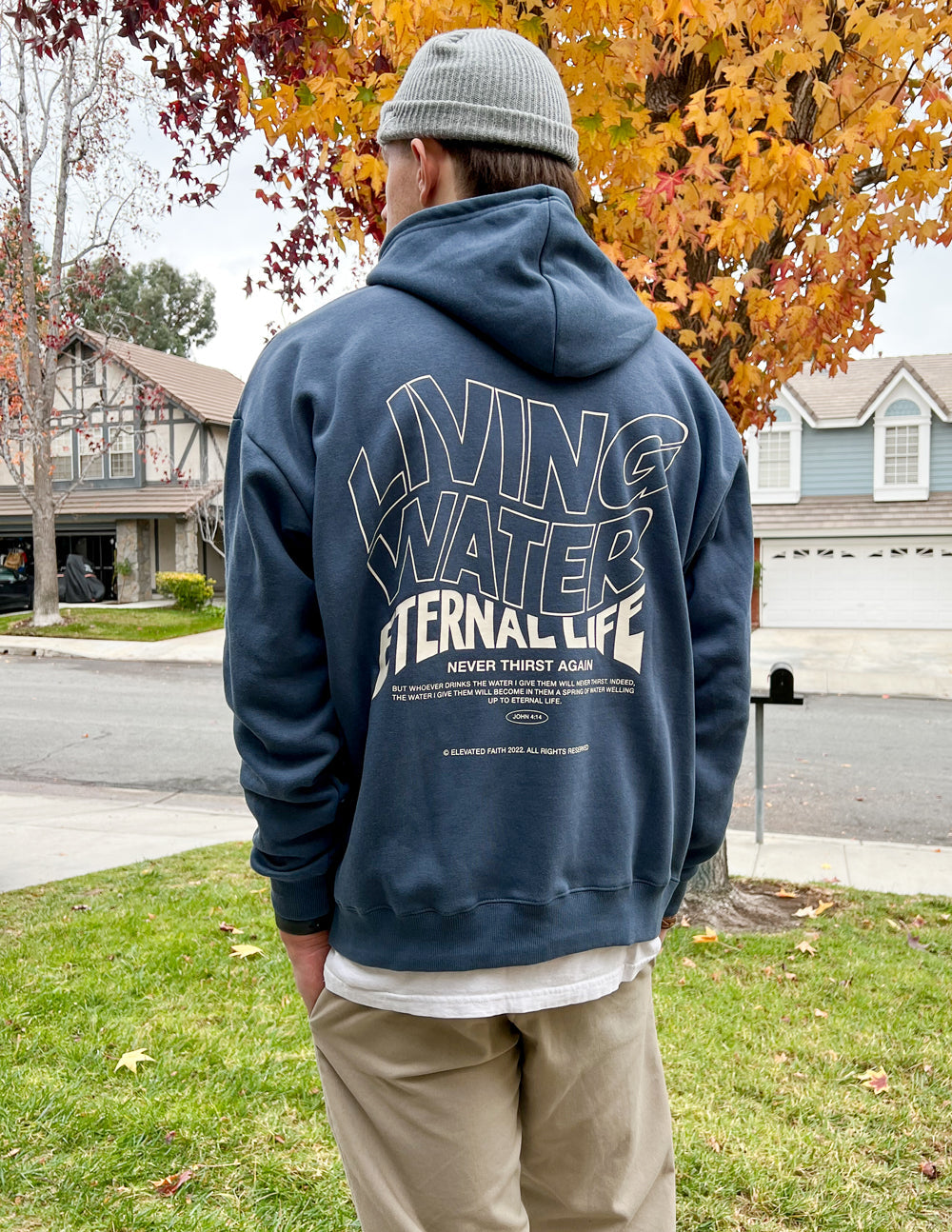Navy Elevated Faith Christian Hoodie featuring 'Living Water Eternal Life' graphic on the back