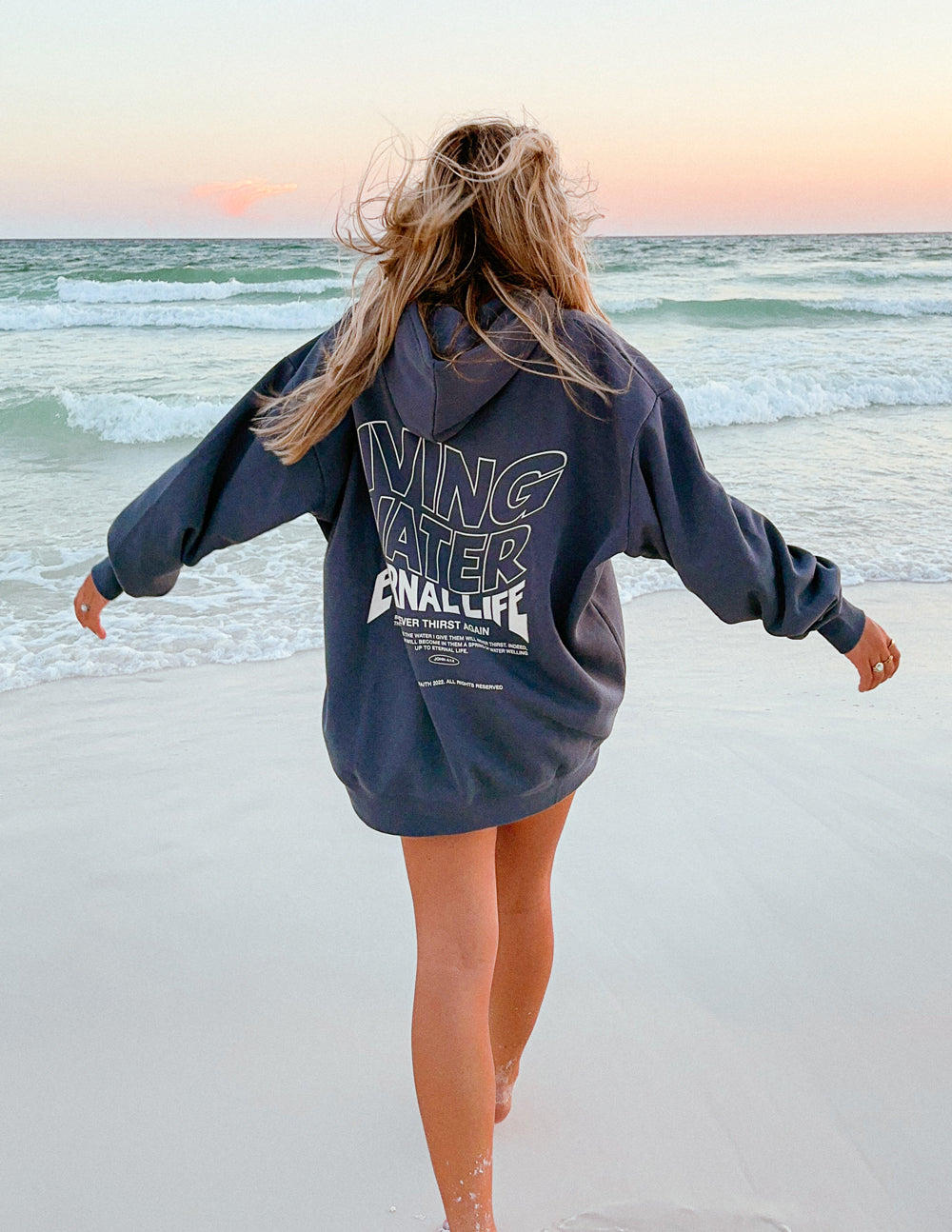 Elevated Faith Christian Hoodie with inspirational graphic on the back, perfect for beach outings