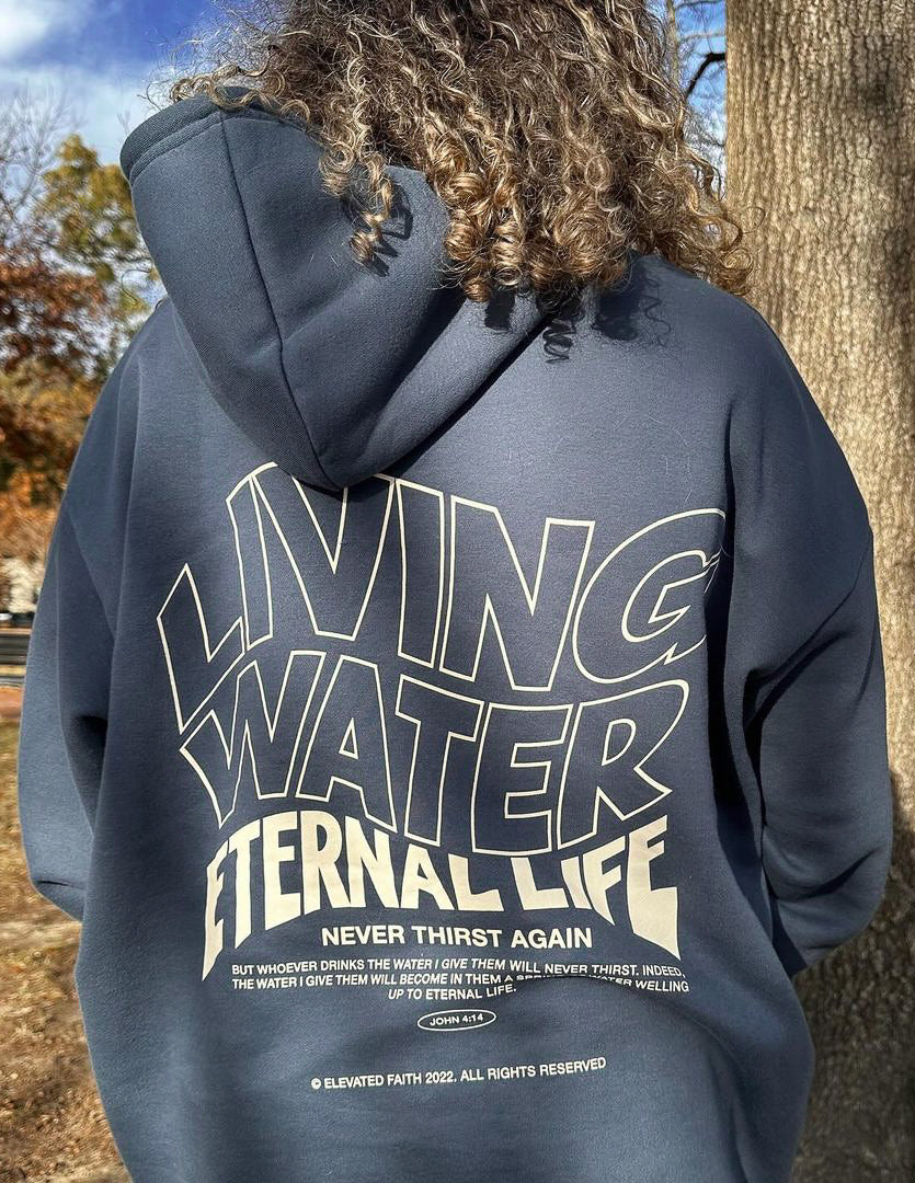 Elevated Faith Christian Hoodie featuring bold text saying Living Water Eternal Life for a stylish statement