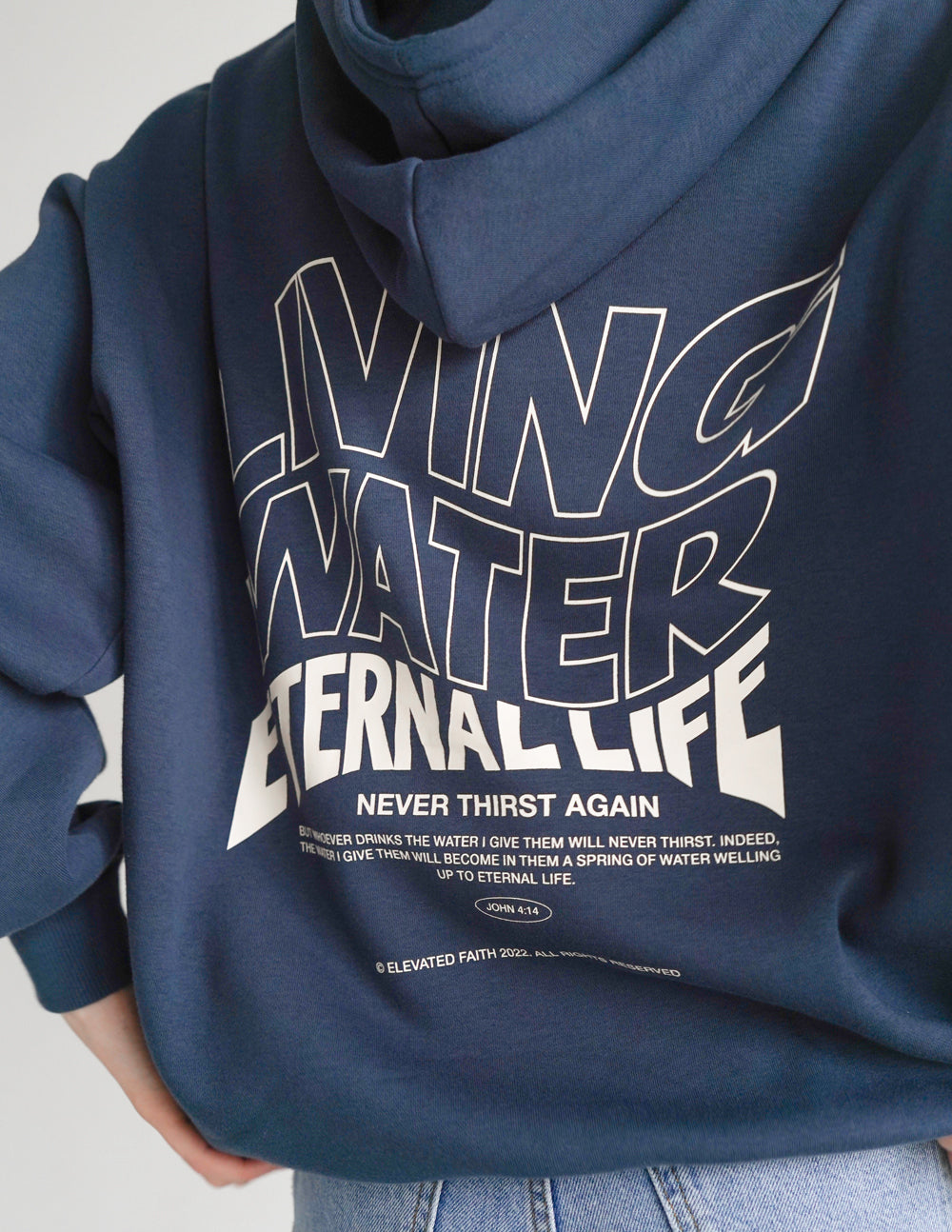 Navy Christian Hoodie featuring 'Living Water' design for comfortable and stylish faith expression