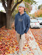 Elevated Faith Christian Hoodie in Navy Blue, perfect for casual outings in autumn leaves