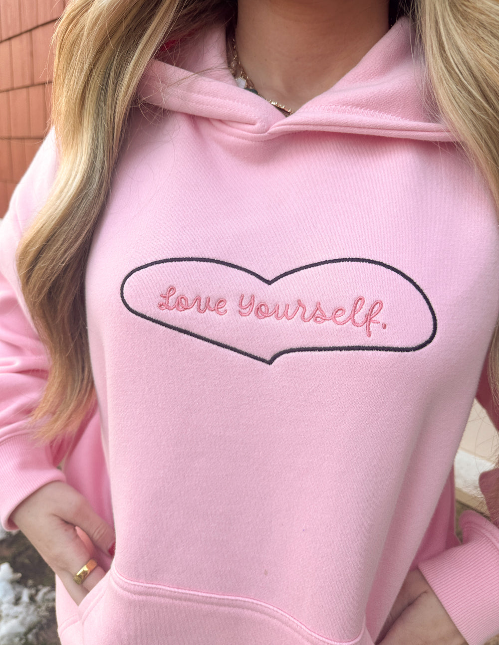 Pink Christian Hoodie featuring 'Love Yourself' embroidery for a stylish and uplifting look