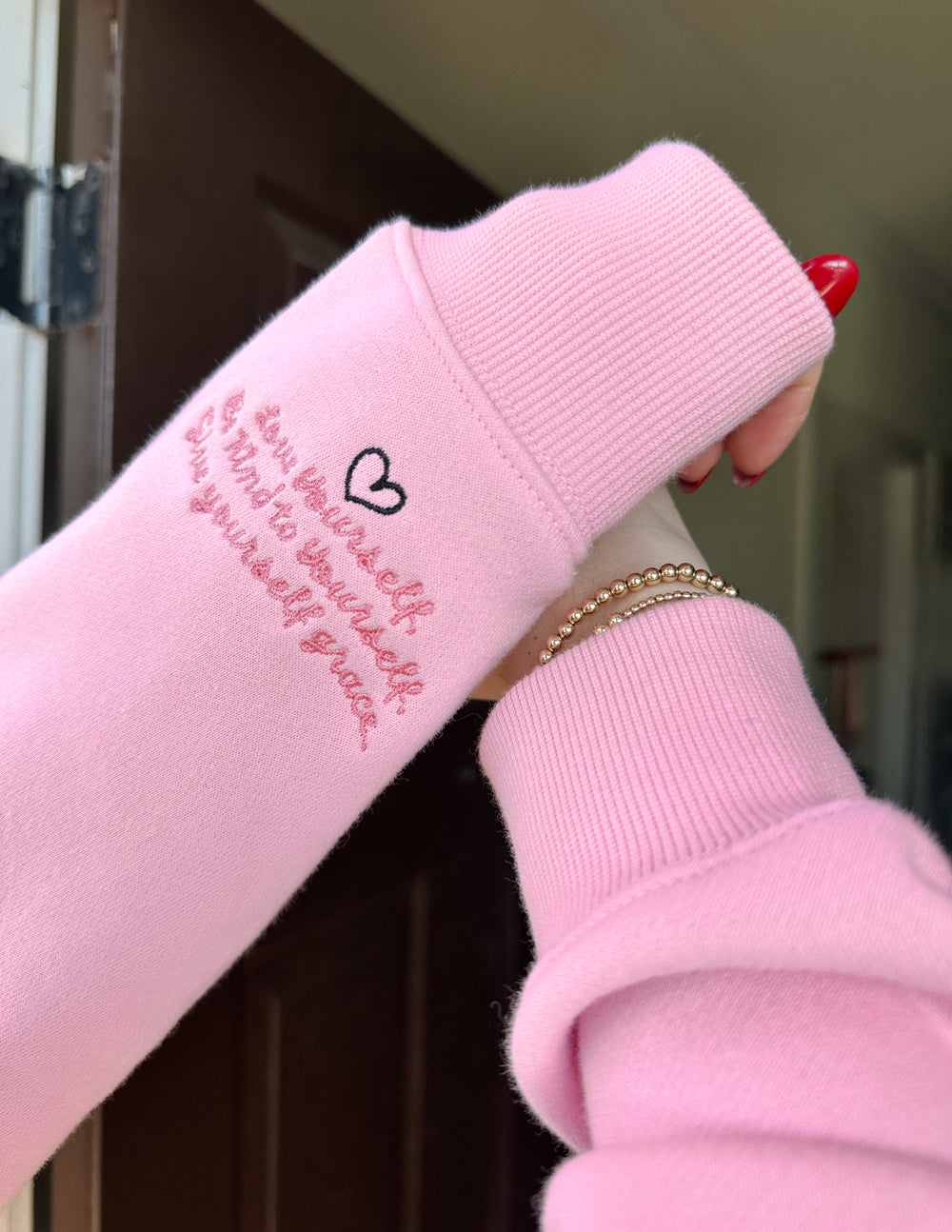 Elevated Faith Christian Hoodie in Pink with Inspirational Sleeve Design and Heart Detail