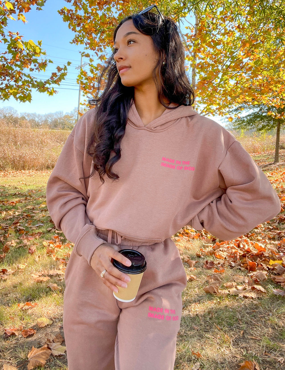 Elevated Faith Christian Hoodie in soft brown fabric with a relaxed fit, styled for outdoor comfort