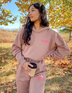 Elevated Faith Christian Hoodie in soft brown fabric with a relaxed fit, styled for outdoor comfort