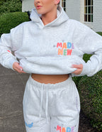 Light gray Elevated Faith Christian Hoodie with colorful 'Made New' design for stylish comfort