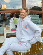 Elevated Faith Christian Hoodie in gray with colorful 'Made New' design, perfect for casual wear
