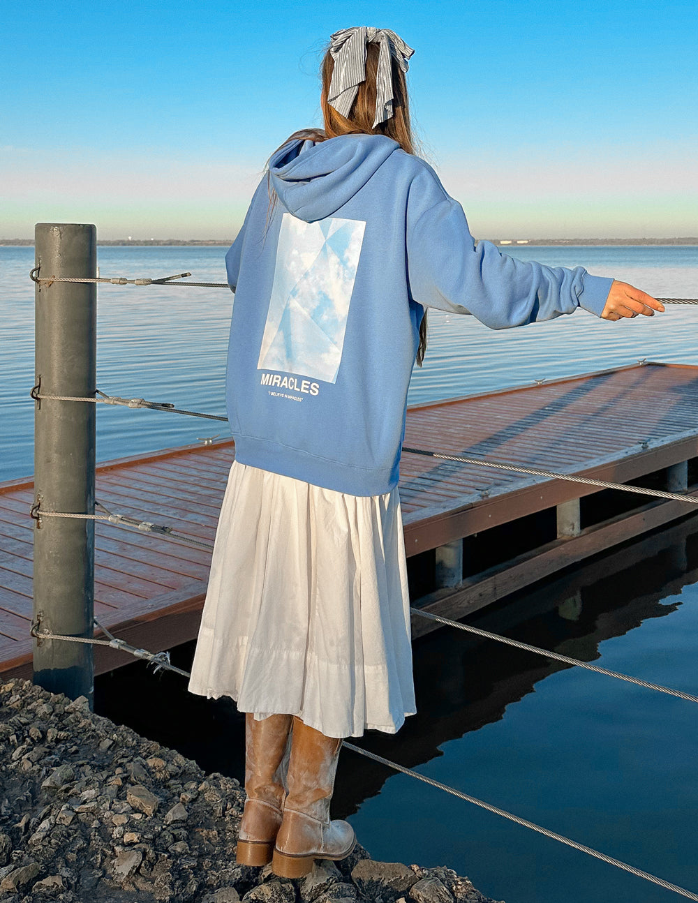 Elevated Faith Christian Hoodie in Light Blue with Miracles Graphic on the Back