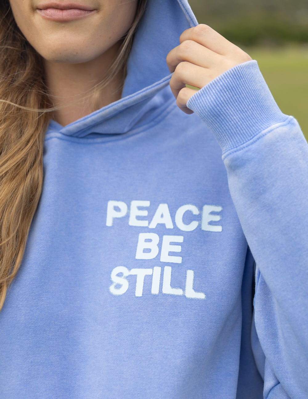 Elevated Faith Christian Hoodie in Light Blue with 'Peace Be Still' Text Design
