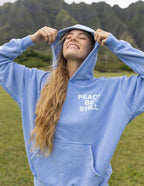 Light blue Christian Hoodie with the phrase Peace Be Still printed on the front, perfect for casual outings