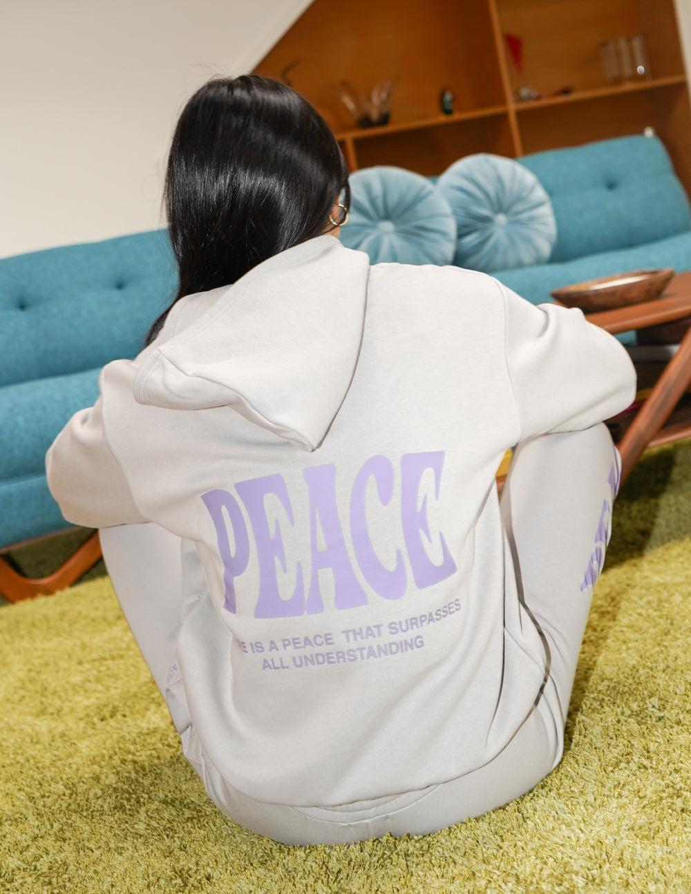 Elevated Faith Christian Hoodie in light gray featuring 'PEACE' graphic and inspirational quote on the back