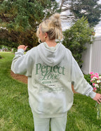 Elevated Faith Christian Hoodie in Pastel Green with 'Perfect Love' Graphic on the Back