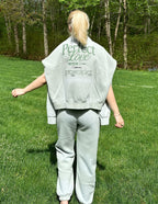 Elevated Faith Christian Hoodie in light gray featuring 'Perfect Love' graphic on the back