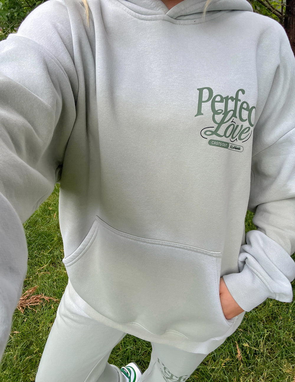 Elevated Faith Christian Hoodie in light gray with 'Perfect Love' print and a front pocket