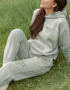 Elevated Faith Christian Hoodie in Soft Green with Perfect Love Design for Comfortable Outfits