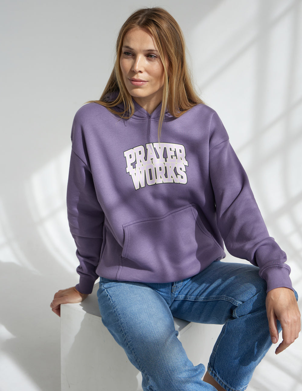 Elevated Faith Christian Hoodie in Purple with 'Prayer Works' Graphic for Stylish Spiritual Wear