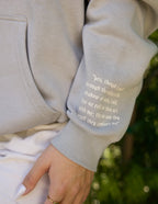Elevated Faith Christian Hoodie in gray with inspirational scripture on the sleeve
