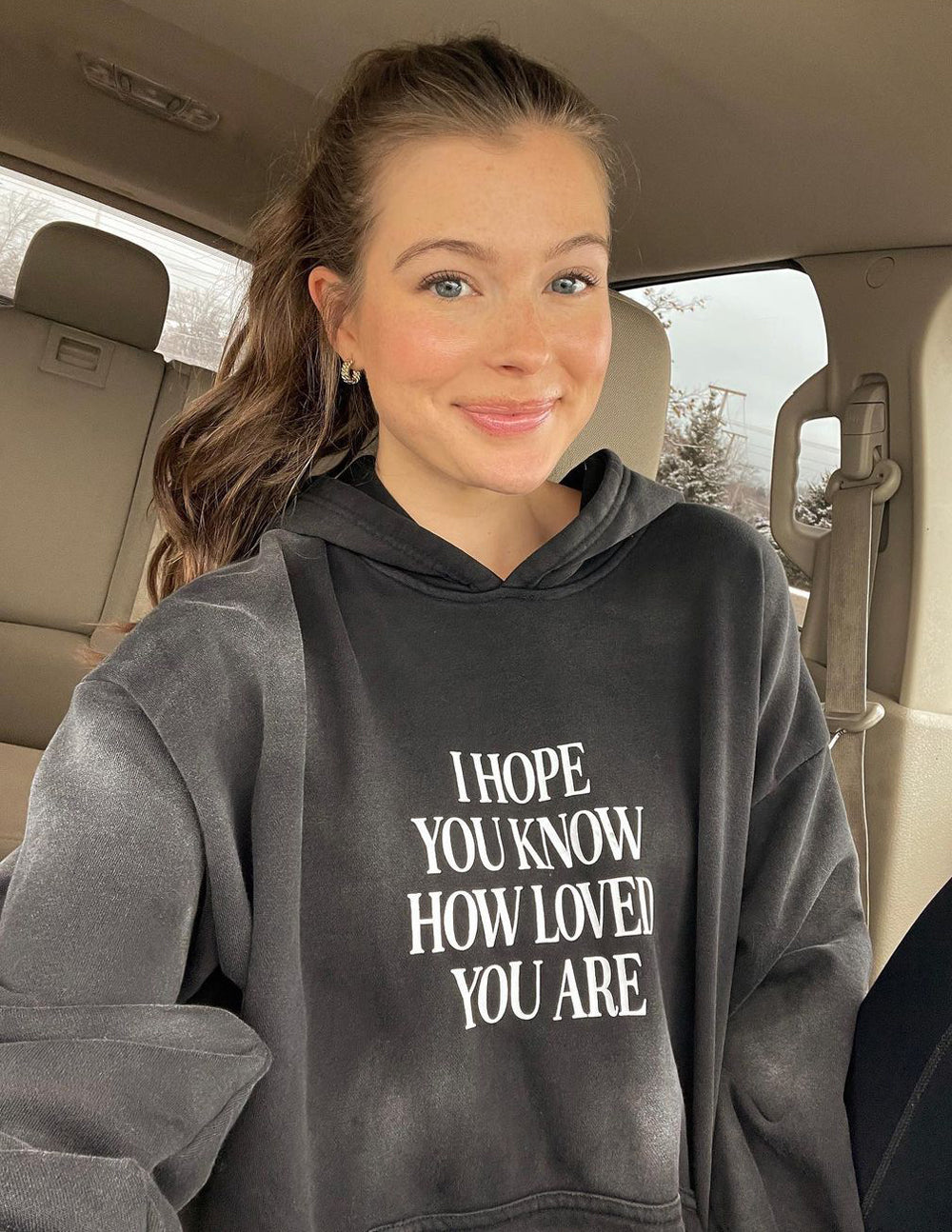 Elevated Faith Christian Hoodie in Black with a message on how loved you are