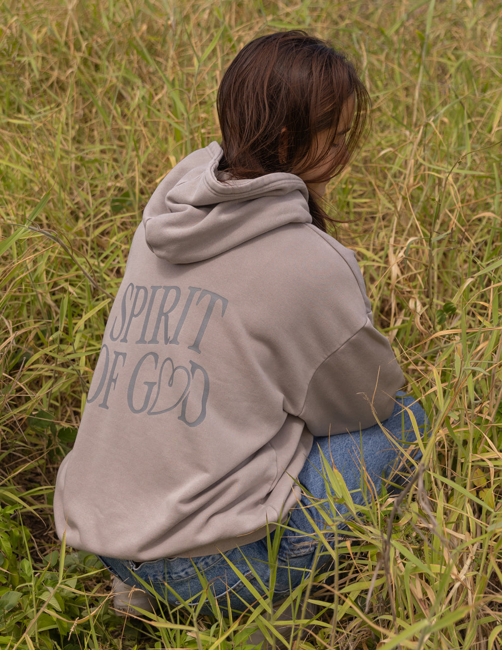 Elevated Faith Christian Hoodie in gray featuring the text Spirit of God on the back for a stylish look