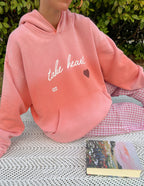Elevated Faith Christian Hoodie in soft pink with 'take heart' text and heart design for comfort and inspiration