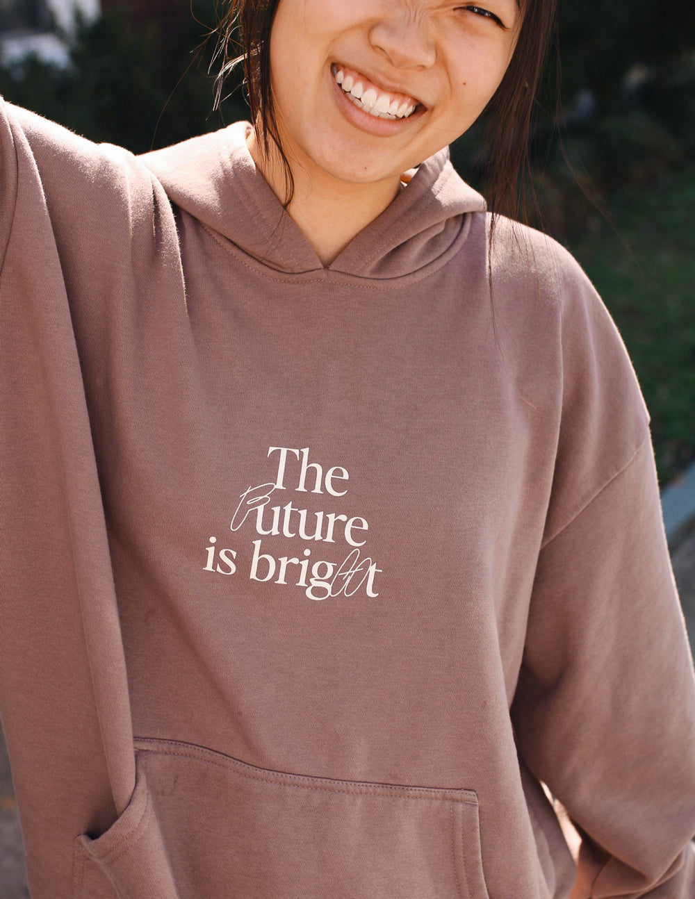 Elevated Faith Christian Hoodie in brown with the phrase The future is bright printed on it