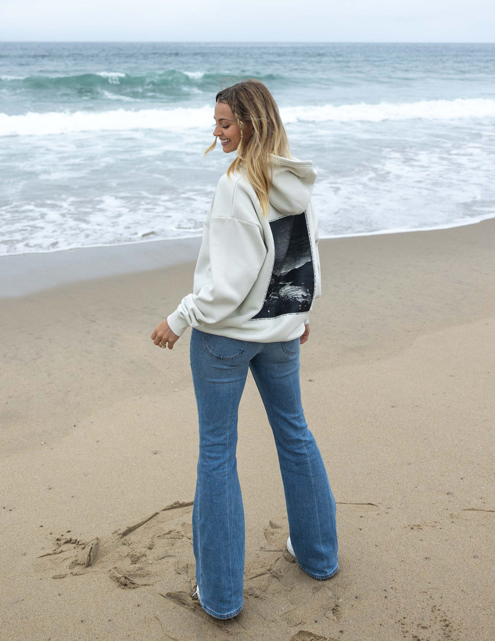 Elevated Faith Christian Hoodie in White with Stylish Back Design on a Beach